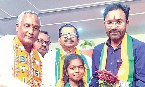 Kishan Reddy felicitates green activist Nainika