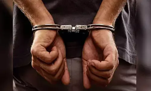 Former watchman and associates held for robbery