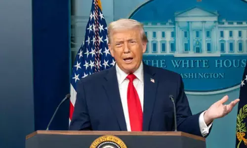 Trump warns Iran to negotiate as US armada moves closer