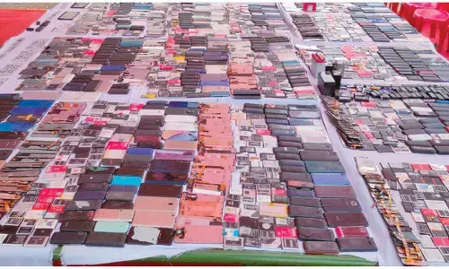 Over 1K mobile phones seized from 21 burglars