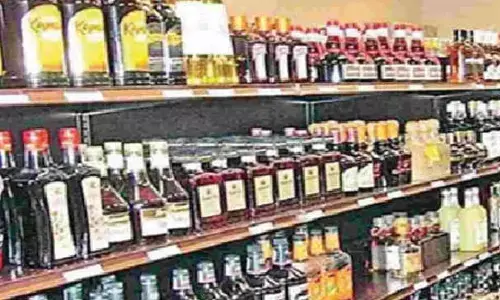 Dy CM warns liquor shops against overcharging