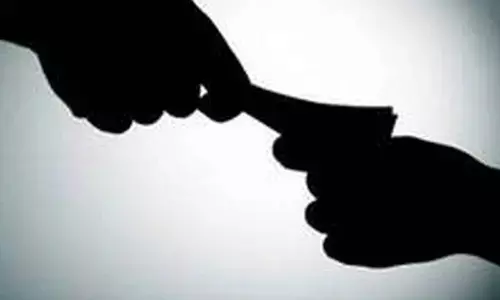 Two govt officials nabbed by ACB in separate bribery cases