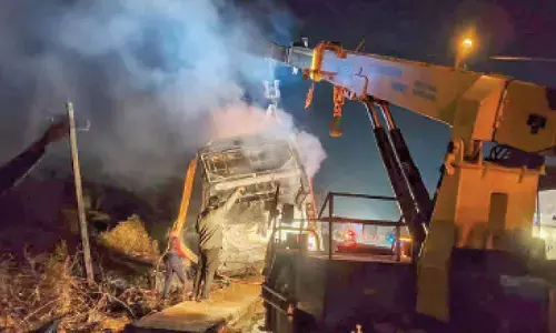 Thirty passengers escape after bus falls into ditch, catches fire