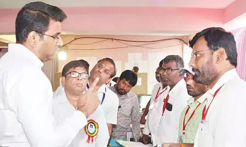 Collector reviews postal ballot arrangements