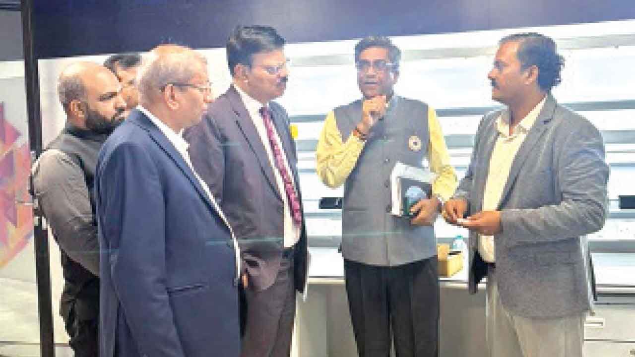 Telecom official pats VTU R&D CENTRE