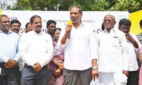 Minister distributes bicycles to students