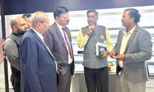 Telecom official pats VTU R&D CENTRE