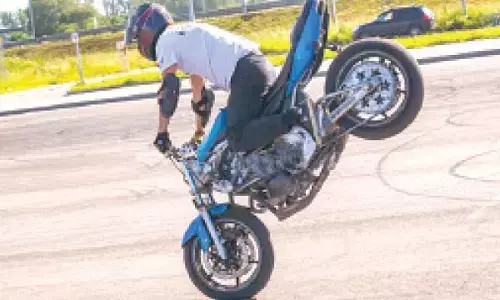 Biker held for dangerous stunts