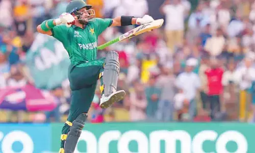 Sahibzada ton, bowlers lift Pak into Super Eights