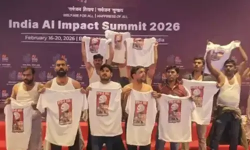 Youth Congress members stage shirtless protest at AI Summit, detained Youth Congress members stage shirtless protest at AI Summit, detained
