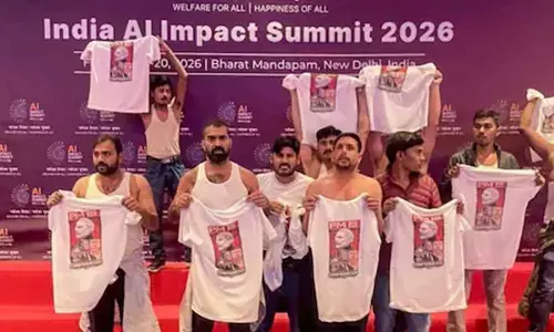 YC workers stage shirtless protest