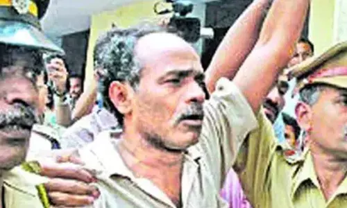 Top Maoist surrenders before police with 50 cadres