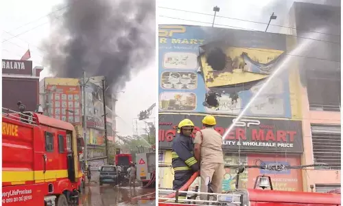 Fire rips through market complex
