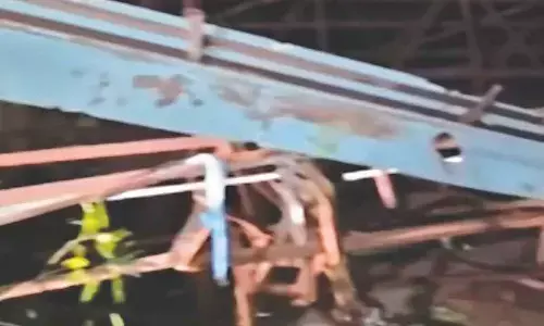 Two die as hoarding collapses during thunderstorm