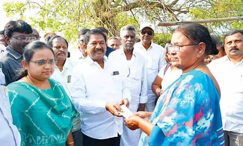 Minister Swamy distributes NTR Bharosa pensions Minister Swamy distributes NTR Bharosa pensions