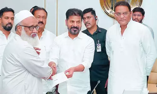 CM distributes cheques to kin of Medina bus crash victims