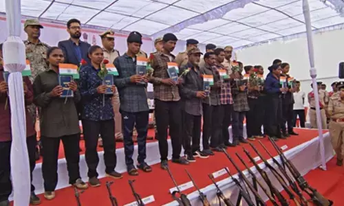 15 Maoists, including 9 women, surrender in Chhattisgarh; hand over AK-47s, INSAS rifles 15 Maoists, including 9 women, surrender in Chhattisgarh; hand over AK-47s, INSAS rifles