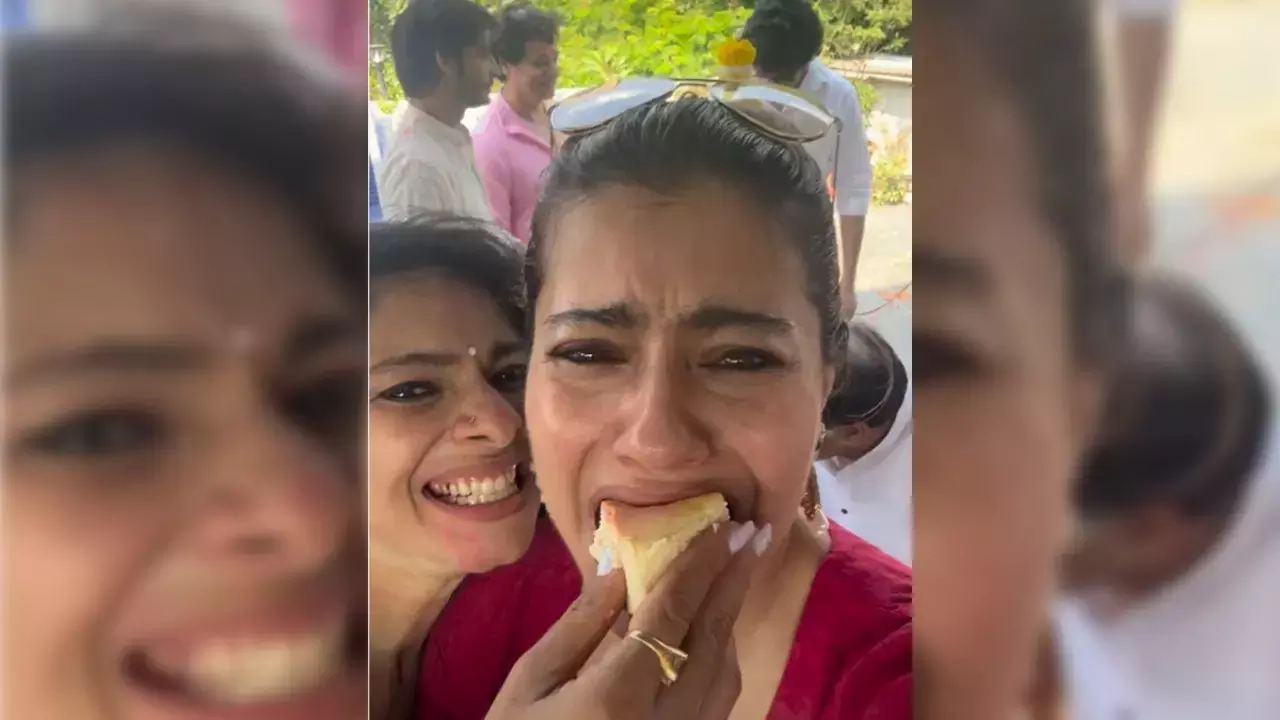 Kajol asks my birthday or your? as sister Tanishaa force feeds her cake Kajol asks my birthday or your? as sister Tanishaa force feeds her cake