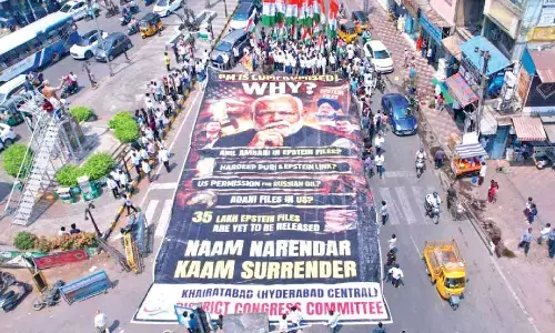 PM compromised; Congress protests with 100-foot banner PM compromised; Congress protests with 100-foot banner