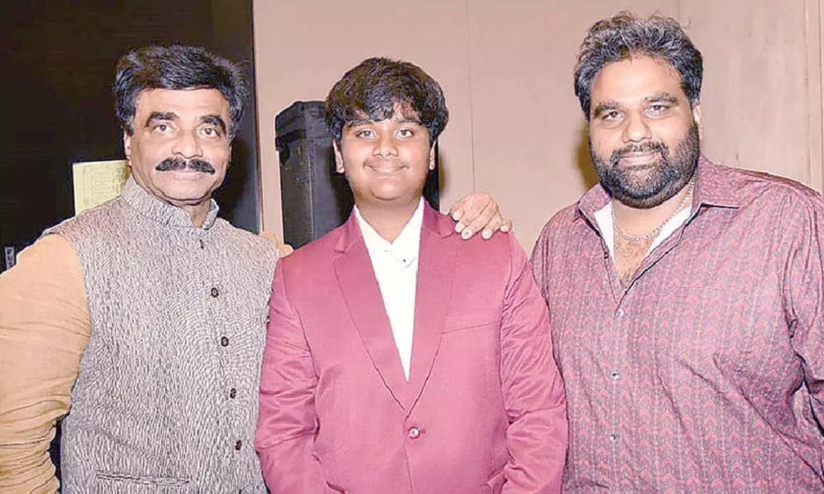 Film producer’s grandson sets triple record in Rubik’s Cube challenge Film producer’s grandson sets triple record in Rubik’s Cube challenge