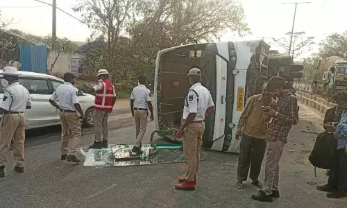 Mini-Bus Overturns in Miyapur, Several Injured Mini-Bus Overturns in Miyapur, Several Injured