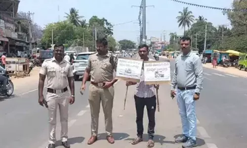 K’taka court sentences man to public service; holding traffic rules sign for safety awareness