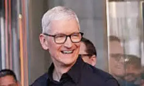 Cook brushes aside exit talk, says ‘not going anywhere’