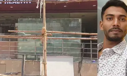 One worker dies after inhaling toxic fumes , three critical