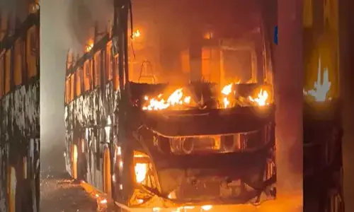 Odisha travels bus catches fire in Ramabhadrapuram, passengers escape unharmed Odisha travels bus catches fire in Ramabhadrapuram, passengers escape unharmed