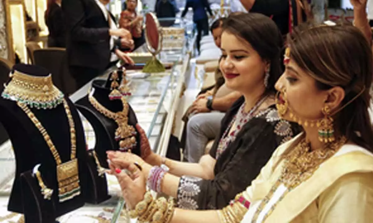 Gold gains over 5 pc on weekly basis amid pull back in crude prices Gold gains over 5 pc on weekly basis amid pull back in crude prices