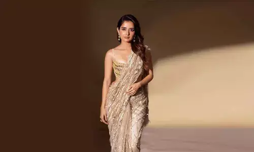 Ashika Ranganath glows gold