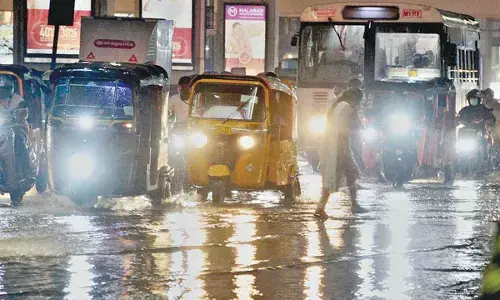 Brief showers bring relief to city; harrowing time for commuters