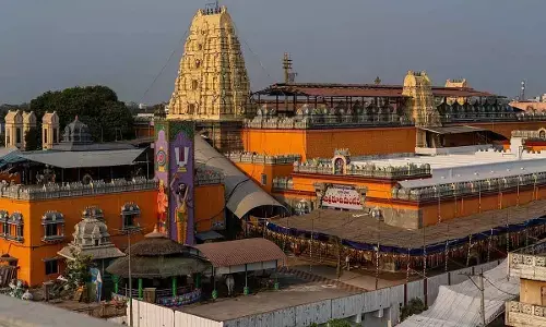 Grand start to Brahmotsavams with sacred flag hoisting at Bhadrachalam