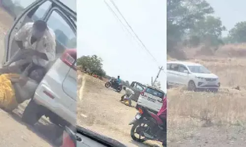 Man kills wife by slitting throat, running car over her