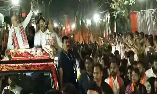 HM Amit Shah holds massive roadshow in Guwahati, steps up BJPs Assam campaign HM Amit Shah holds massive roadshow in Guwahati, steps up BJPs Assam campaign