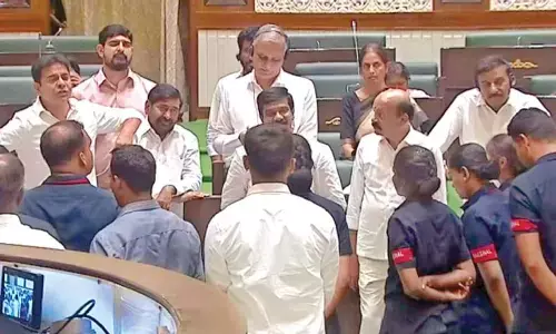 Ruckus in Assembly as Cong, BRS hurl land scam charges Ruckus in Assembly as Cong, BRS hurl land scam charges