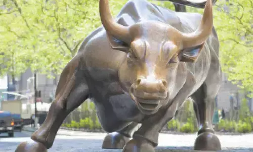 Markets in green as rupee rebounds