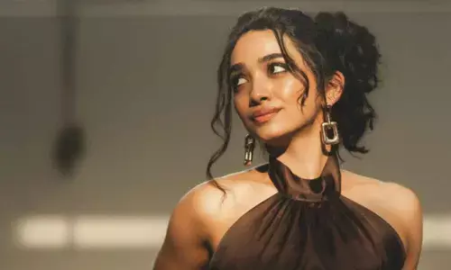 Saanve Megghana turns heads with elegant black gown