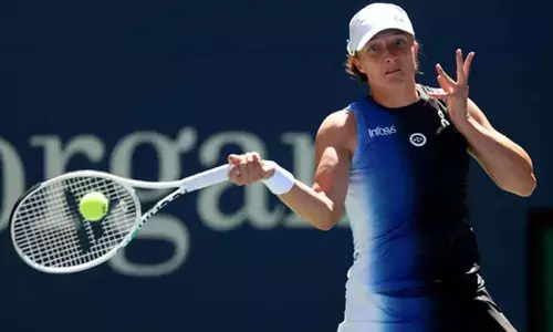 French Open: Swiatek storms into round two with straight sets win over Jones