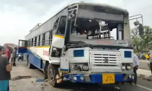Bus and Excavator Collide Near Kovur, Several Injured