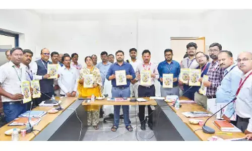 District Collector Hemanta Keshav Patil along with officials unveiling the annual credit plan for Nagarkurnool district on Wednesday