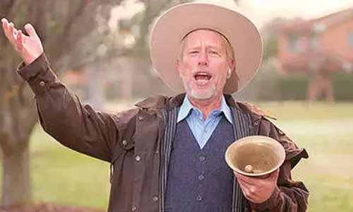 122.4 decibels! Guinness crowns Canberra town crier as worlds loudest person