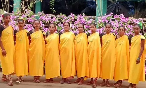 Tribal women practising Dhimsa ahead of the inauguration of the Alluri Sitarama Raju International Airport