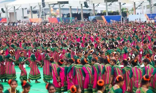 Tribal girls performing mass Dhimsa dance during the launch of ASR International Airport in Bhogapuram.