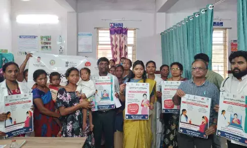 District collector T Nishanthi releasing the World Breastfeeding Week poster in Sunkarametta Primary Health Centre on Monday