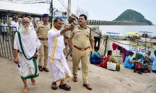 NTR District Police Commissioner SV Rajasekhara Babu, along with Temple Executive Officer VK Seena Naik and senior police officials inspecting Durga Ghat on Monday
