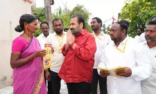 Rural MLA Kotamreddy Sridhar Reddy conducting door-to-door campaign at Vedayapalem of Nellore rural mandal on Monday