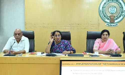 Handlooms and Textiles Minister S Savitha flanked by Principal Secretary RP Sisodia and Commissioner Rekha Rani, addressing the media in Amaravati on Monday