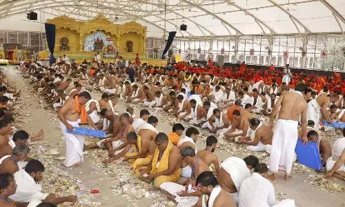 Srisailam temple staff counting hundi collection on Wednesday
