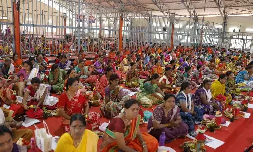 Devotees participating in the mass Varalakshmi Vratam in Srisailam on Friday